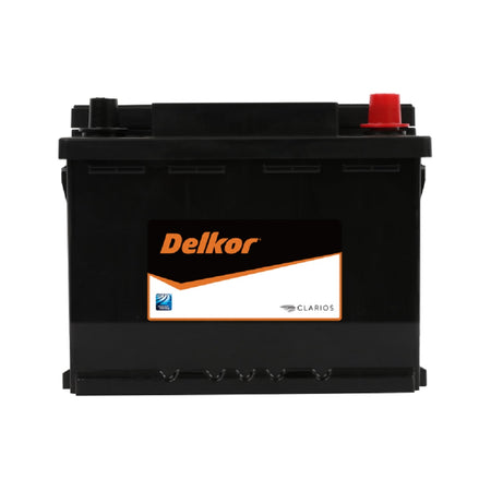 Delkor Automotive Calcium Battery 12V 580CCA-56219. Front view of black battery with orange Delkor logo on black, white and orange label on front.