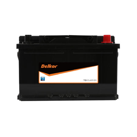 Delkor Battery Automotive Cal 12V 690CCA-57030. Front view of black battery with orange Delkor logo on black, white and orange label on front.