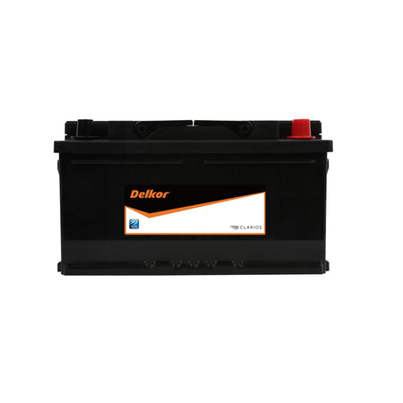 Delkor Battery Automotive CAL 12V 730CCA-58039. Front view of black battery with orange Delkor logo on black, white and orange label on front.