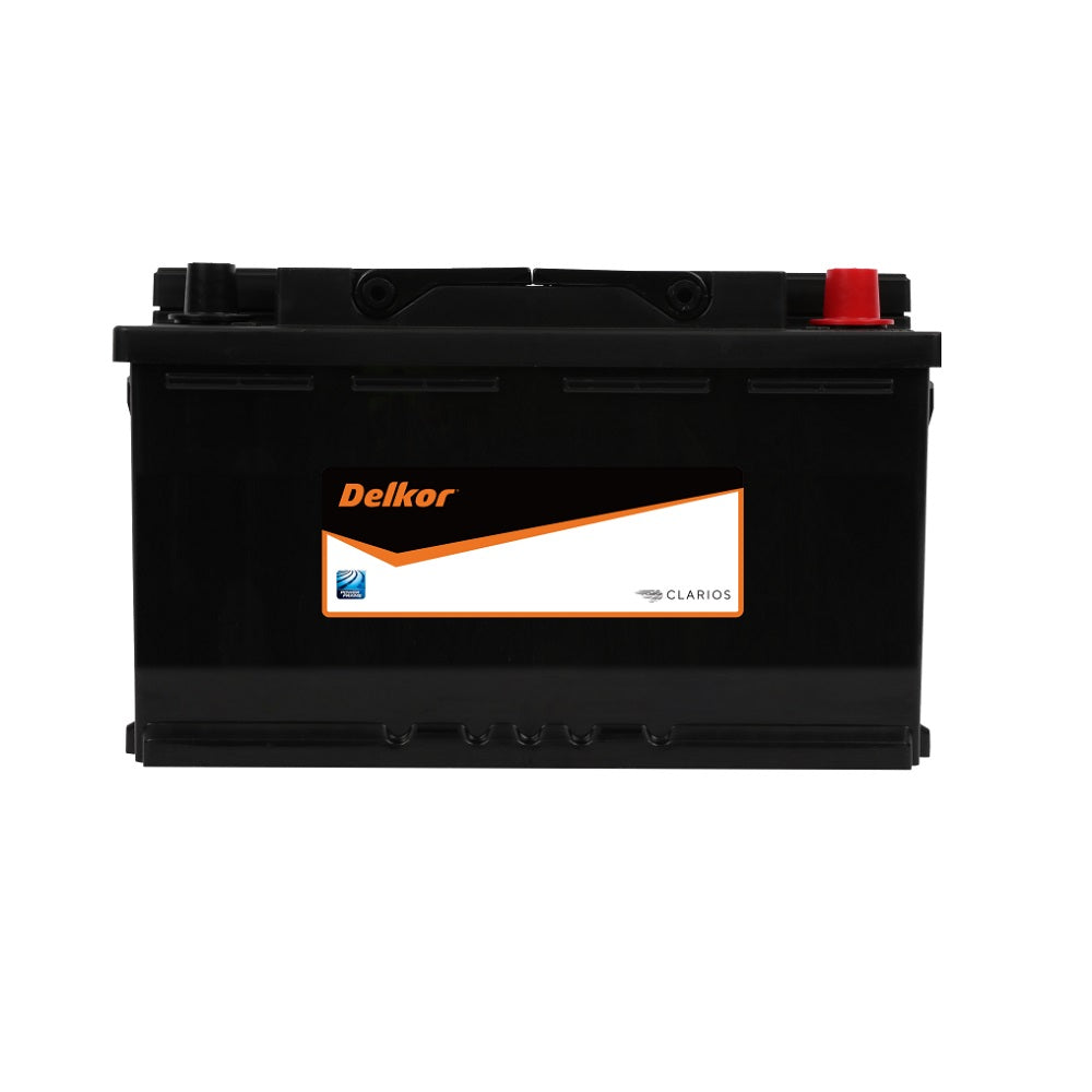 Delkor Battery Automotive CAL 12V 912CCA-59096. Front view of black battery with orange Delkor logo on black, white and orange label.