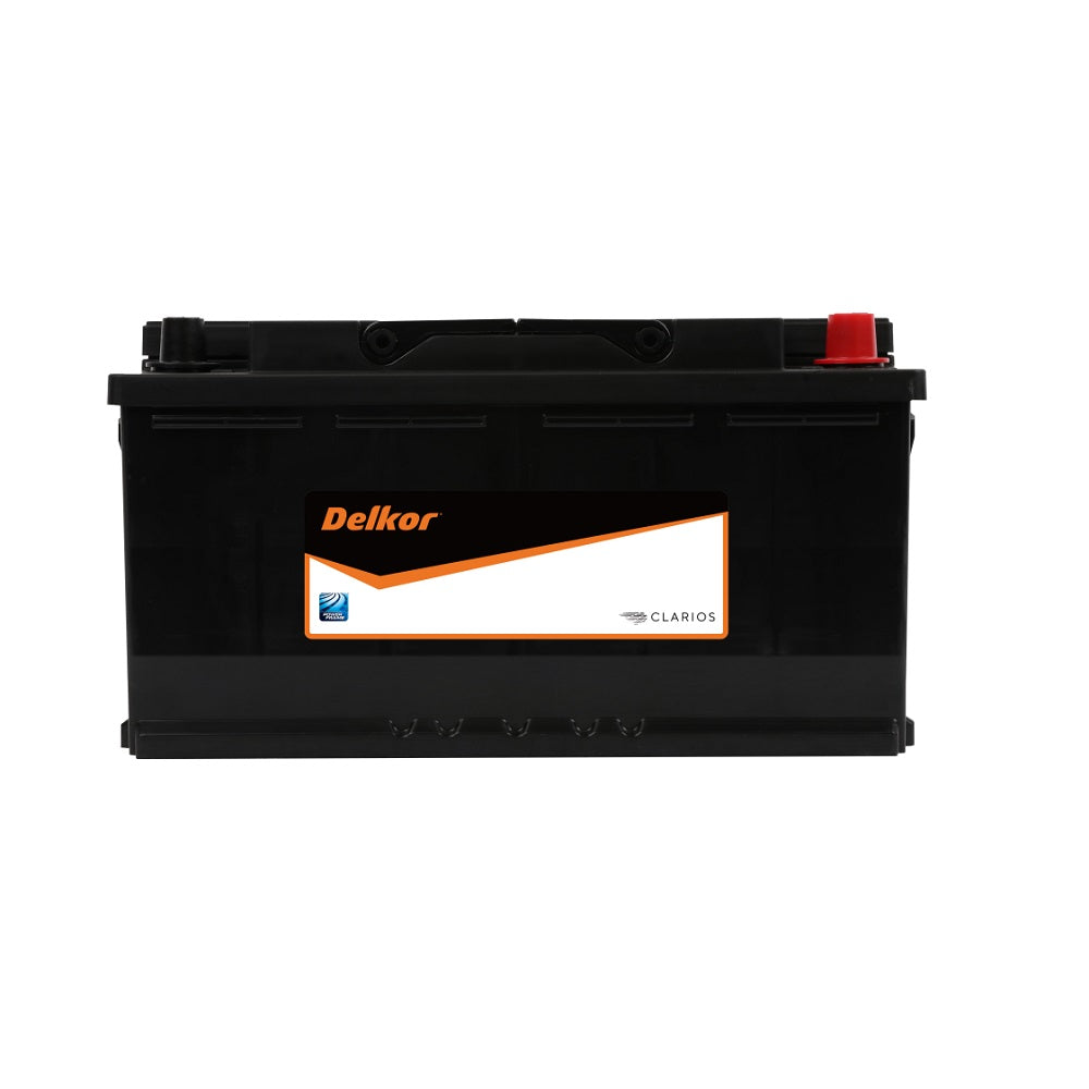 Delkor Battery Automotive CAL 12V 900CCA-60038. Front view of black battery with orange Delkor logo on black, white and orange label on front.