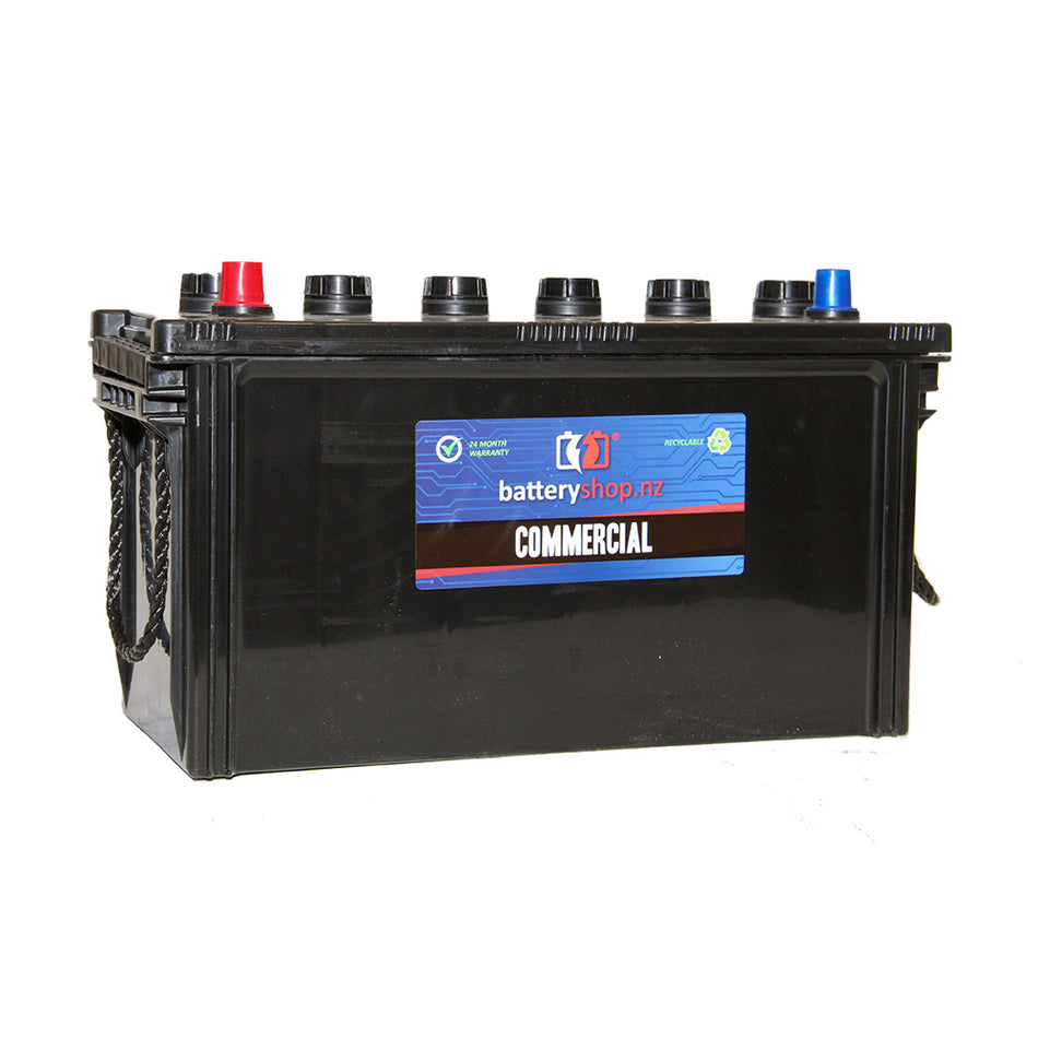 Heavy Duty Battery Commercial  FLA 12V 680CCA.  Angled view showing label and terminals.