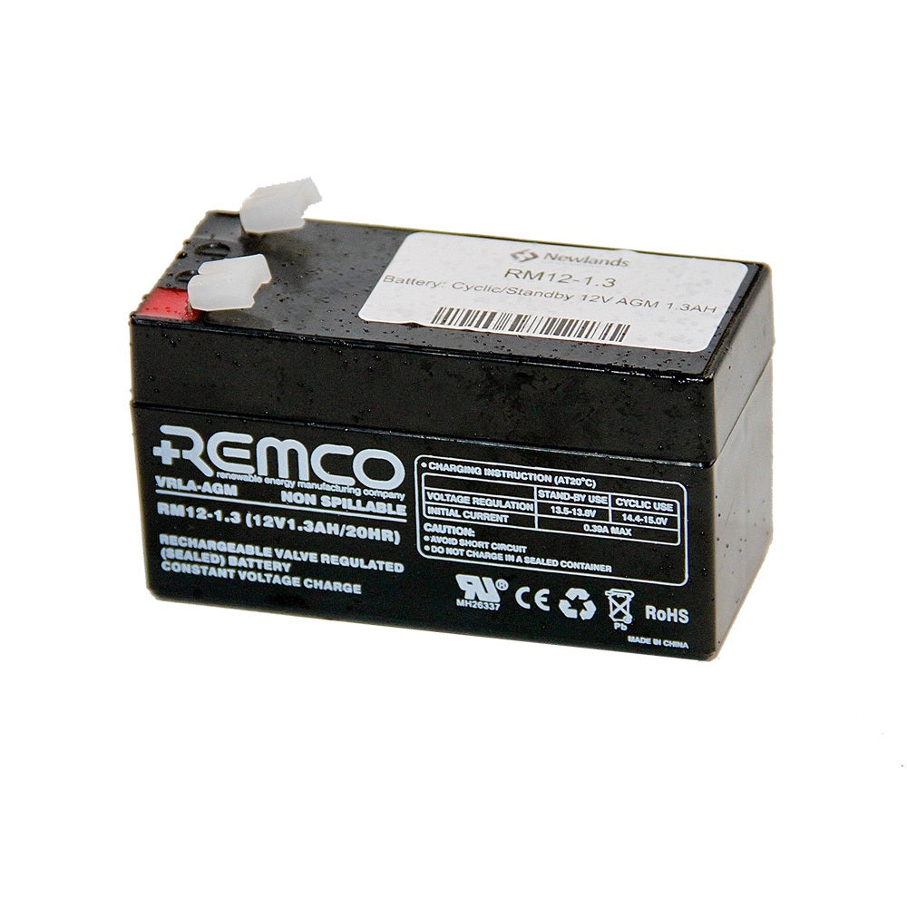 Remco Battery: Cyclic/Stanby 12V AGM 1.3AH-RM12-1.3. Front view of black battery with white Remco logo and white writing on front.